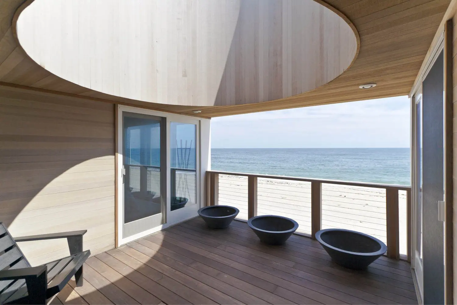 Wooden beachfront deck with circular skylight