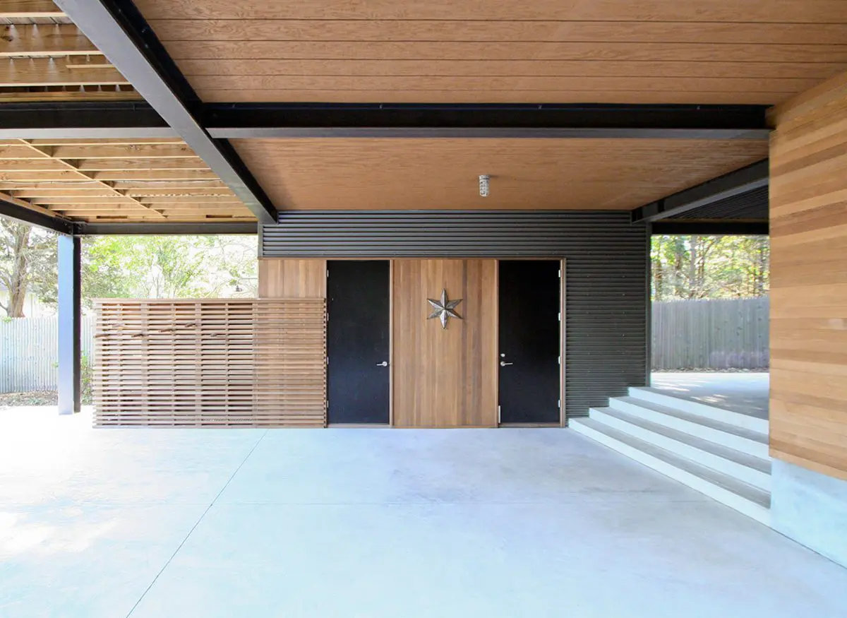 Modern entrance with wooden panels and minimalist design.