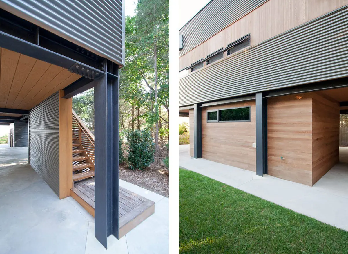Modern house exterior with wooden accents and large garage doors.
