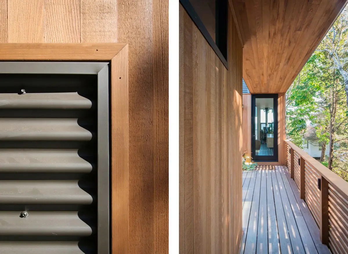 Modern wooden porch with black louvered door and glass door at the end.