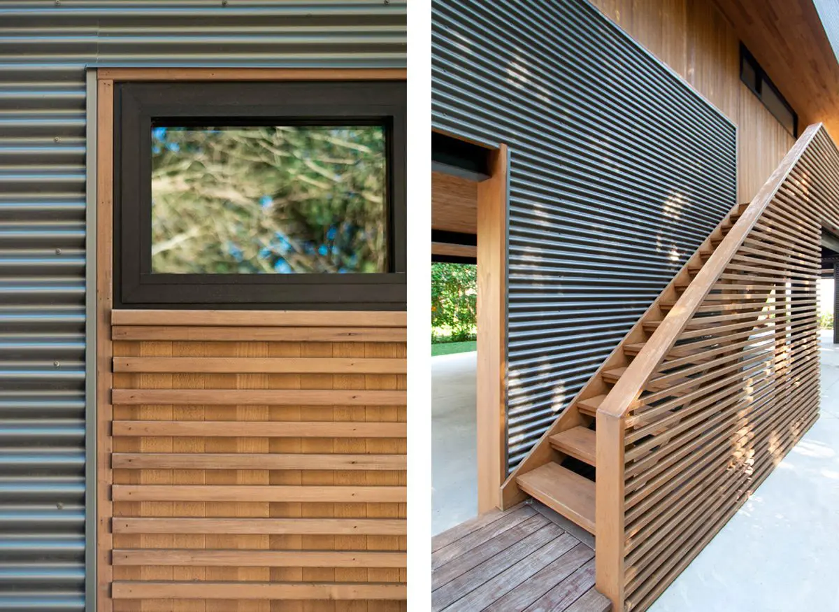 Modern wooden house exterior with horizontal slats and a window.