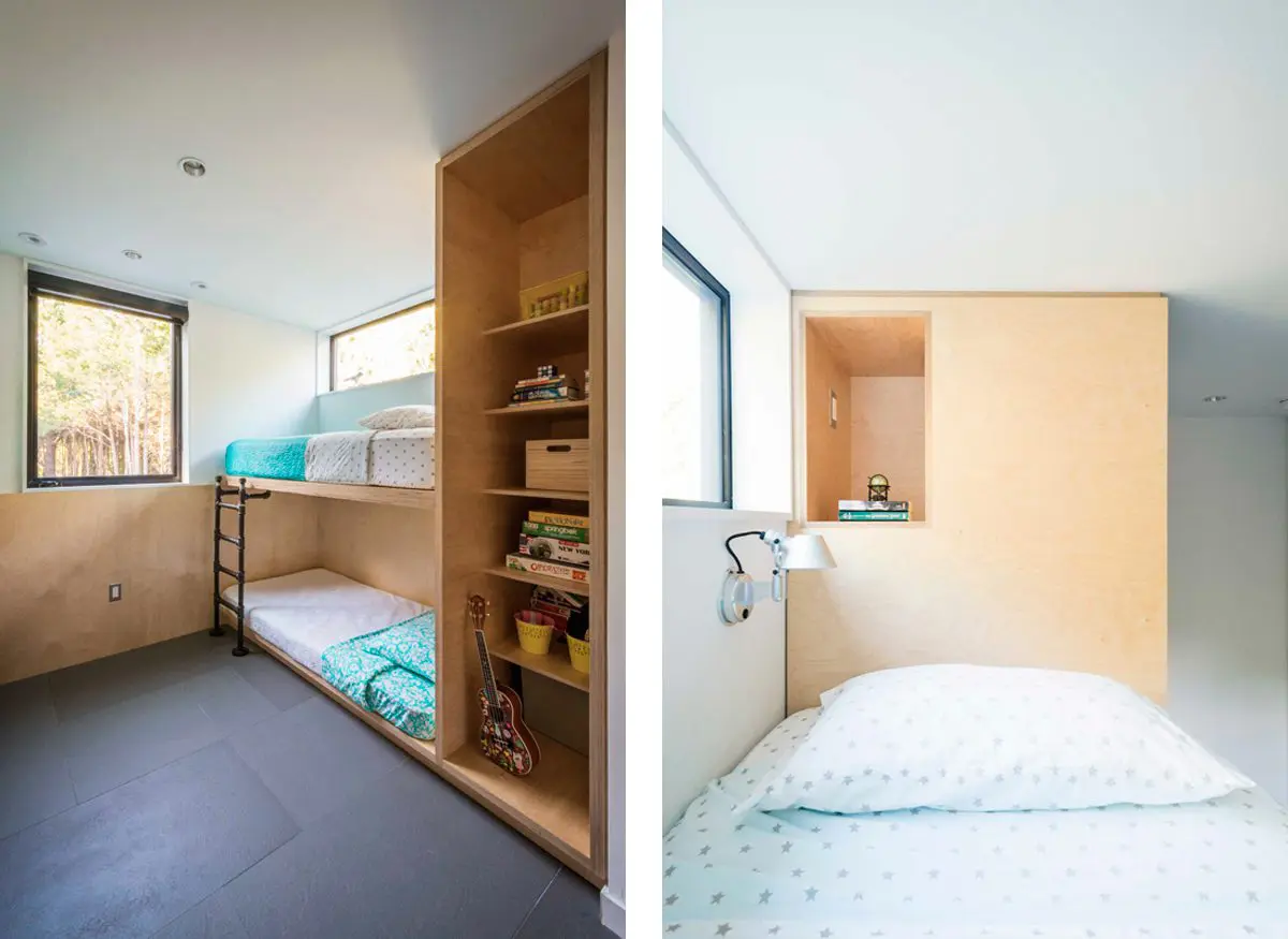 Modern bunk bed area with built-in wooden shelves and cozy bedding.