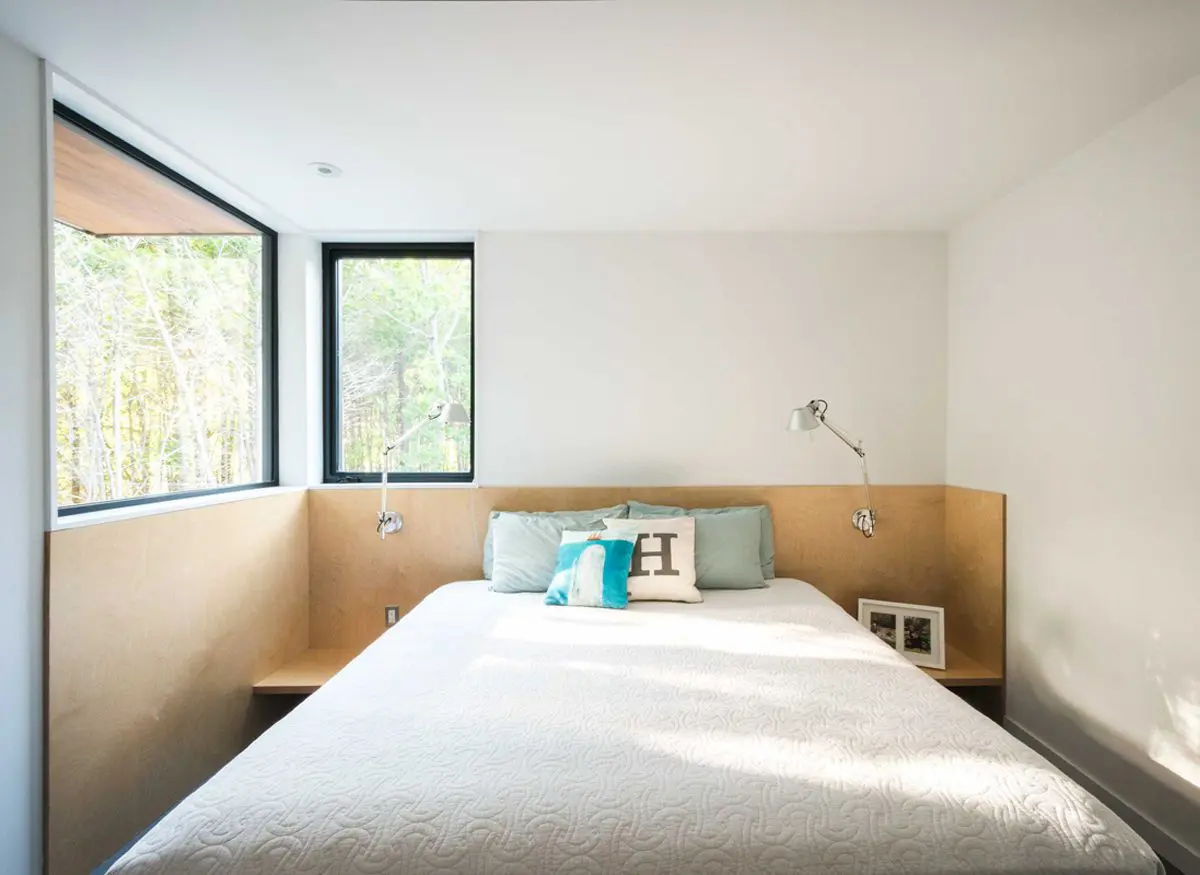 Bright modern bedroom with corner windows